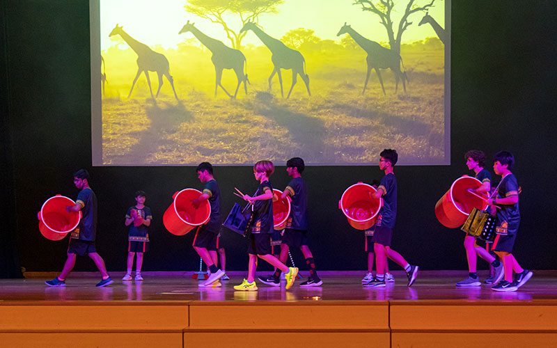 OFS Middle School students performing during global concert