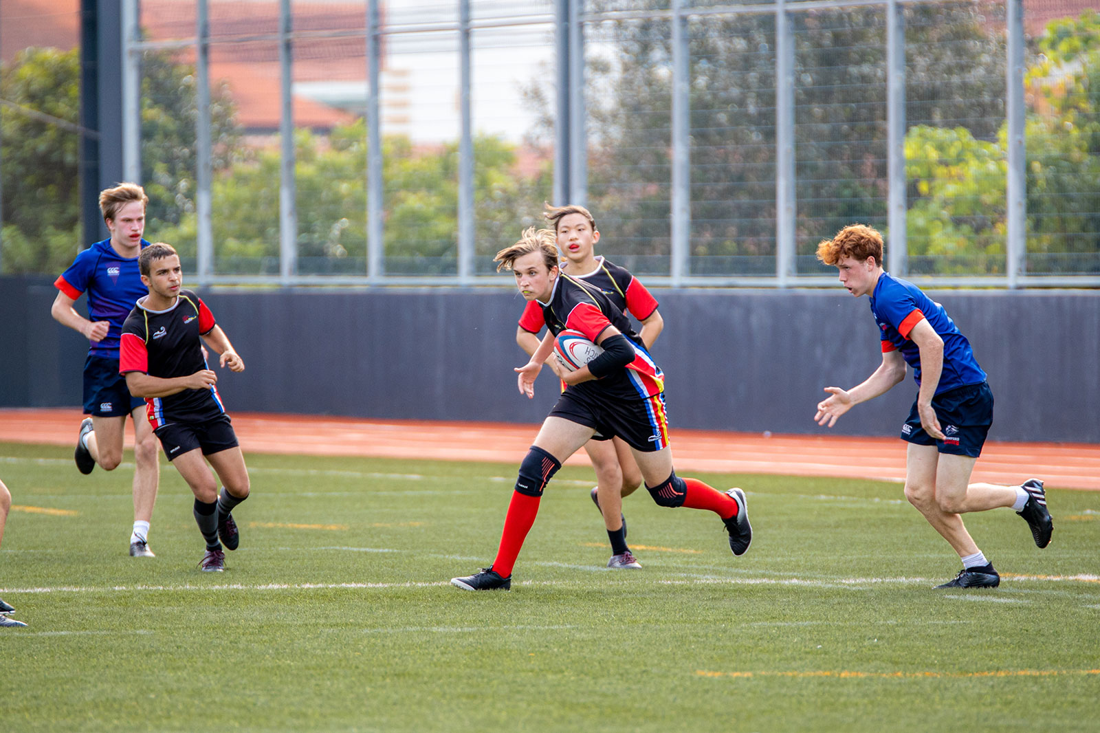 OFS High School students in a rugby match