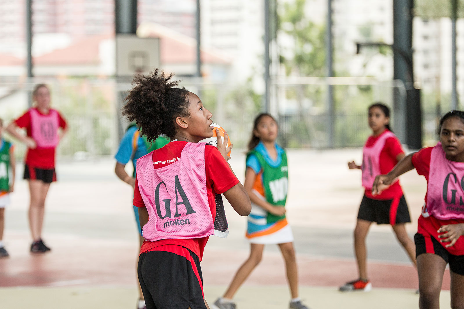 OFS Middle School students in a netball match