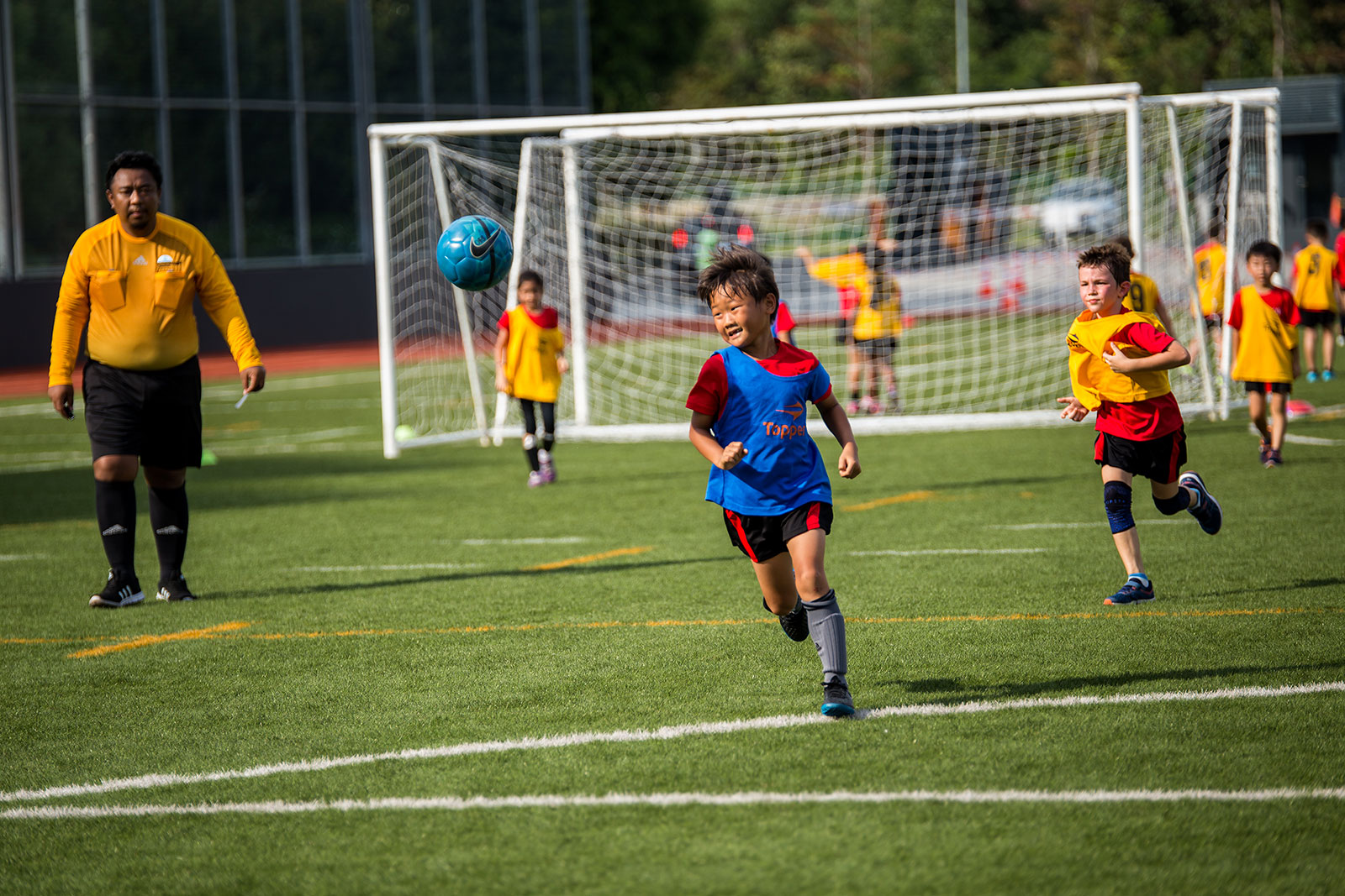 OFS Elementary School students in a football match