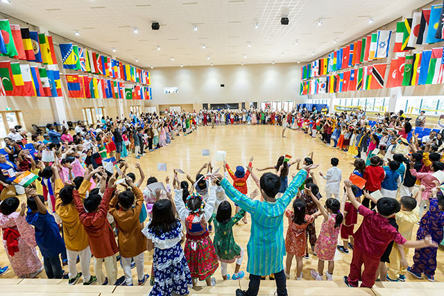 OFS Elementary School students performing in the auditorium