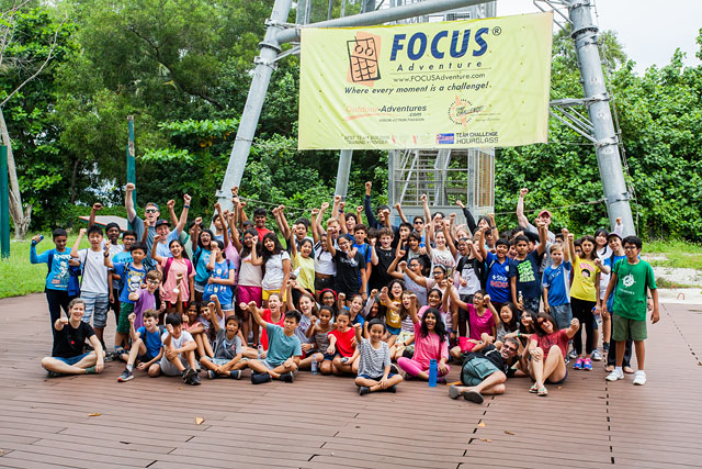 OFS Middle School Grade 7 students and teachers posing for camera at the end of camp