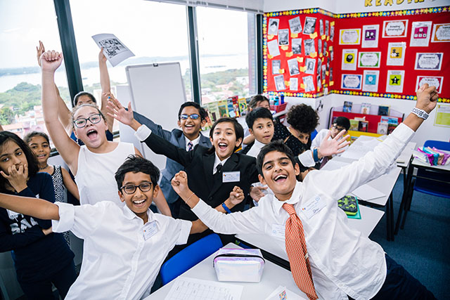 OFS Elementary School Grade 5 students posing for camera during Moden United Nations (PY-MUNOFS) event