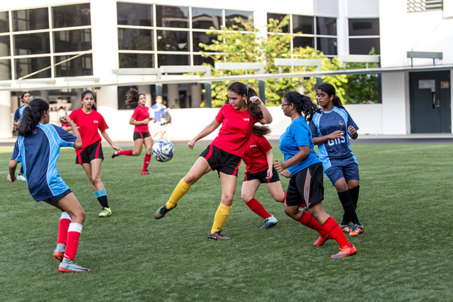 OFS High School Girls football team playing against other schools