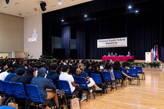 Students listening to speech during Model United Nations at Overseas Family School (MUNOFS XII) conference