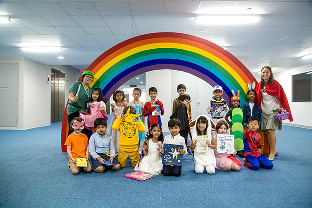 Two OFS Elementary School students shaking hands after a chess match